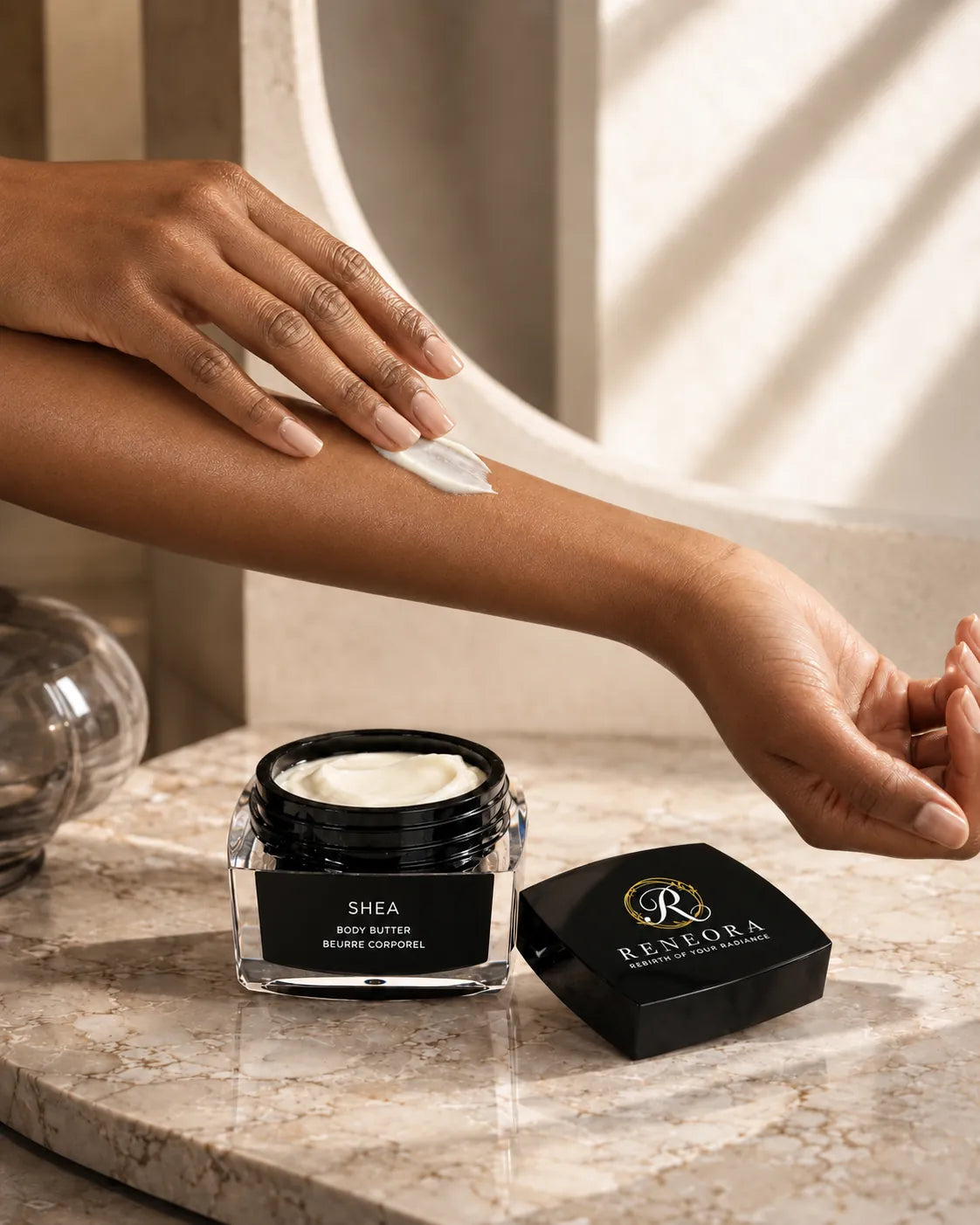 Reneora Shea Body Butter applied to the forearm